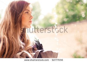 stock-photo-beautiful-girl-posing-outdoors-in-the-summer-92777056