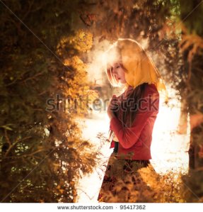 stock-photo-cute-girl-enjoying-the-sun-in-the-park-95417362