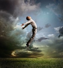 spiritual-beliefs_OMTimes_bigstock-Young-Man-Jumping-Up-To-Sky-71026729-s